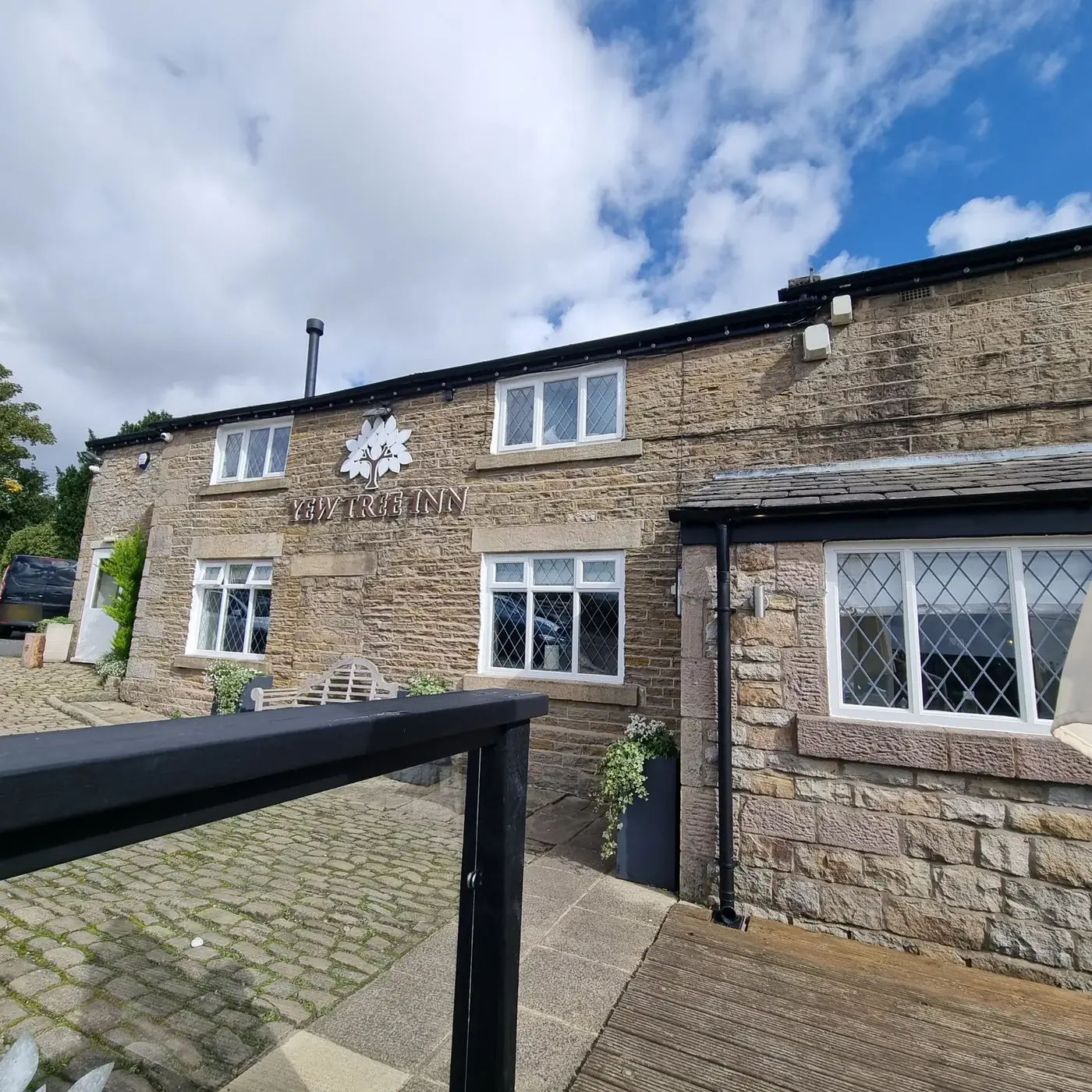 The stone front of the Yew Tree Inn, Anglezarke